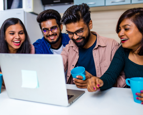 indian-four-people-in-kitchen-looking-at-laptop-an-2022-04-11-22-00-09-utc2